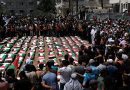 Palestinians Hold Mass Funeral for Recovered Bodies from 2023 Gaza Strike